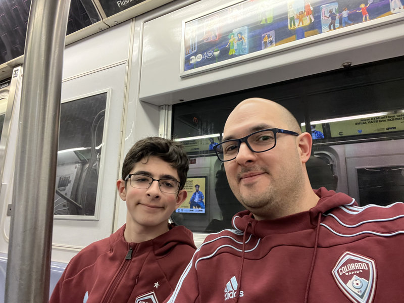 Two men on the subway.
