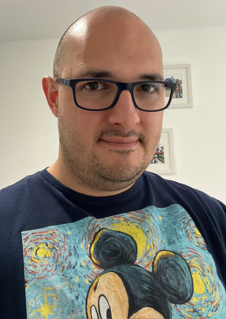 Selfie of a man with a gigantic, bald head.